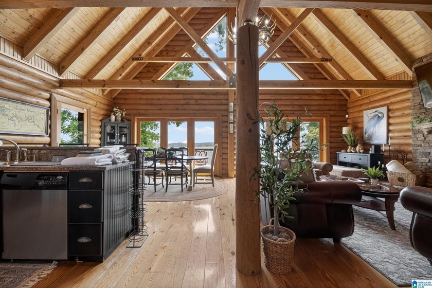 Experience refined lakefront living in this exceptional log - photo 17