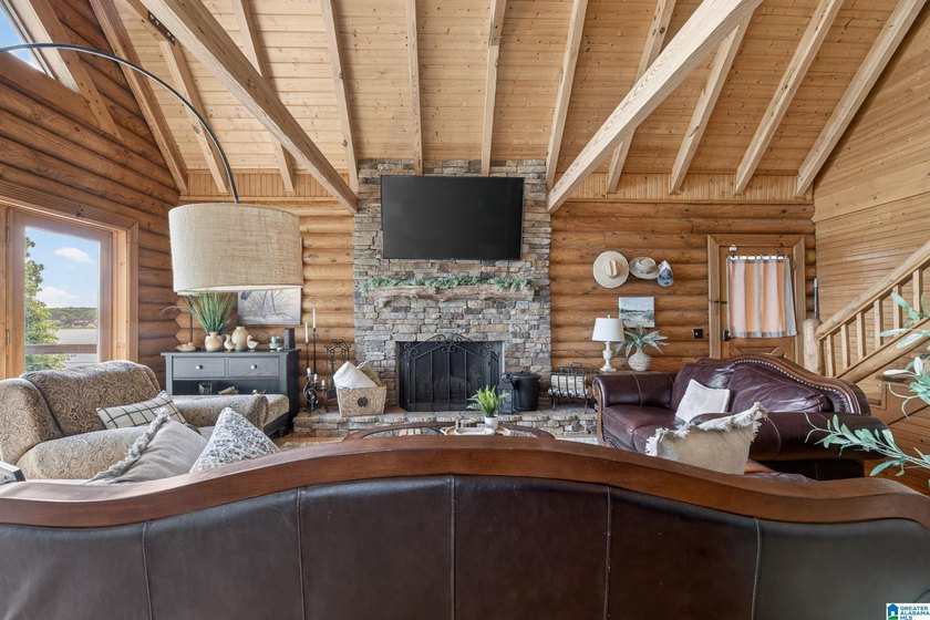 Experience refined lakefront living in this exceptional log - photo 19