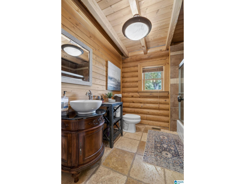 Experience refined lakefront living in this exceptional log - photo 20