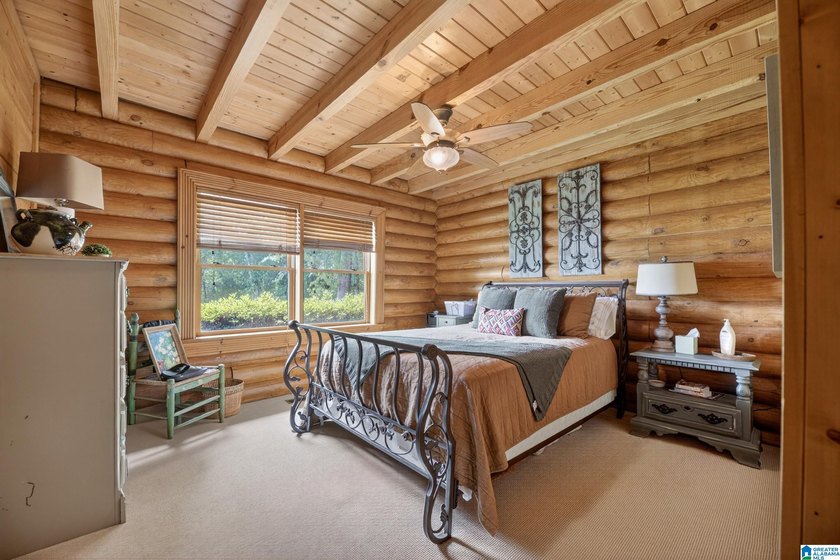 Experience refined lakefront living in this exceptional log - photo 25