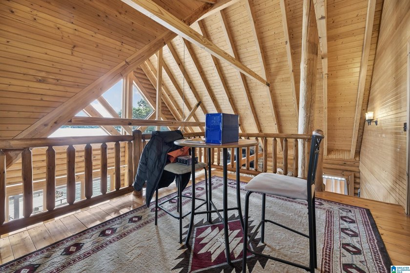 Experience refined lakefront living in this exceptional log - photo 27