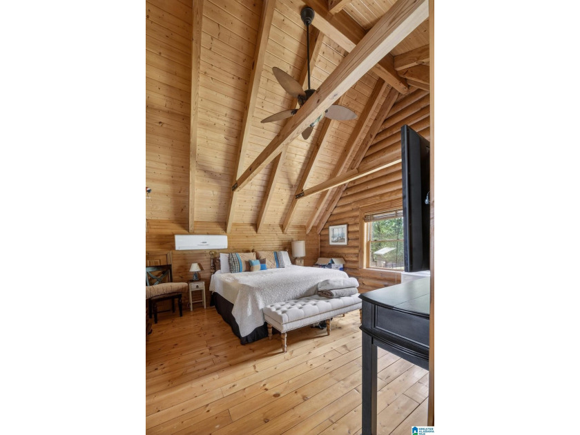 Experience refined lakefront living in this exceptional log - photo 33