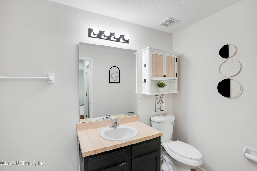 Welcome to this charming 4-bedroom, 2-bathroom home offering - photo 33