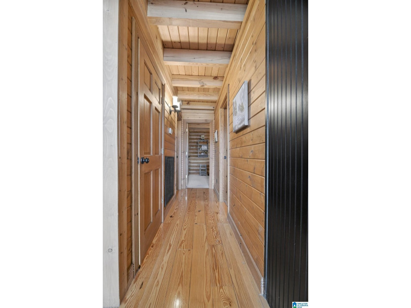 Experience refined lakefront living in this exceptional log - photo 35