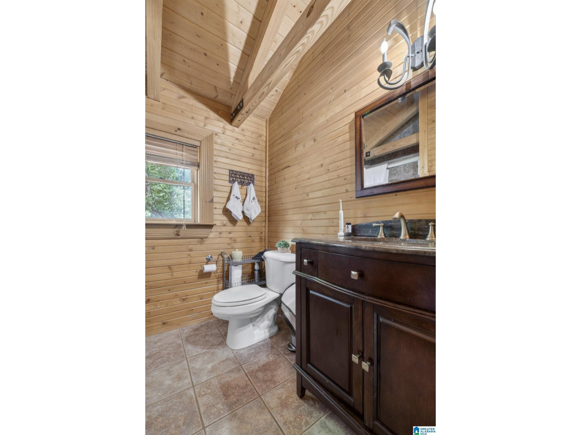 Experience refined lakefront living in this exceptional log - photo 39
