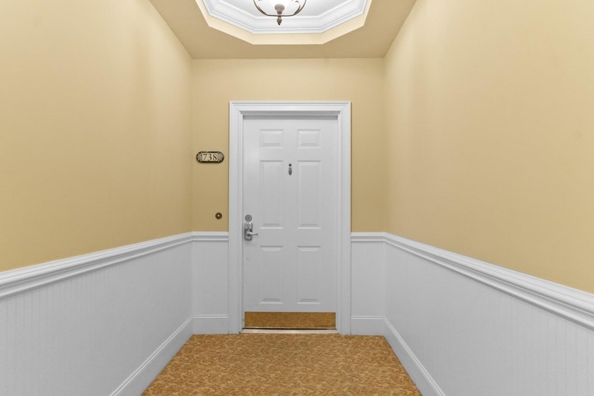 Sunlight pours into this bright, open 3-bedroom, 2-bath end-unit - photo 3