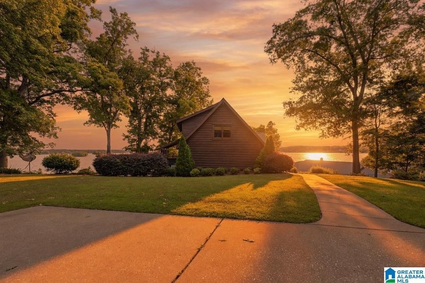 Experience refined lakefront living in this exceptional log - photo 44