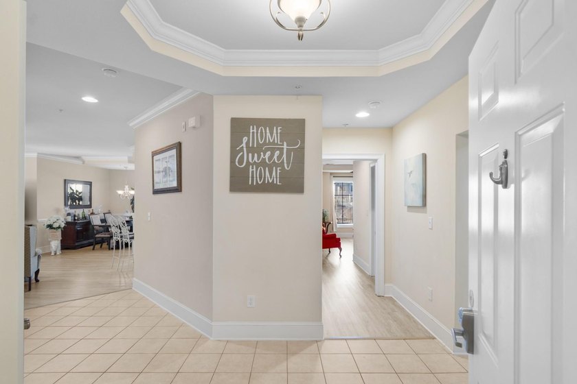Sunlight pours into this bright, open 3-bedroom, 2-bath end-unit - photo 4