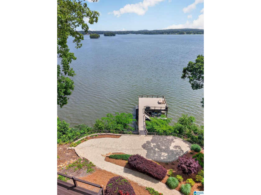 Experience refined lakefront living in this exceptional log - photo 48