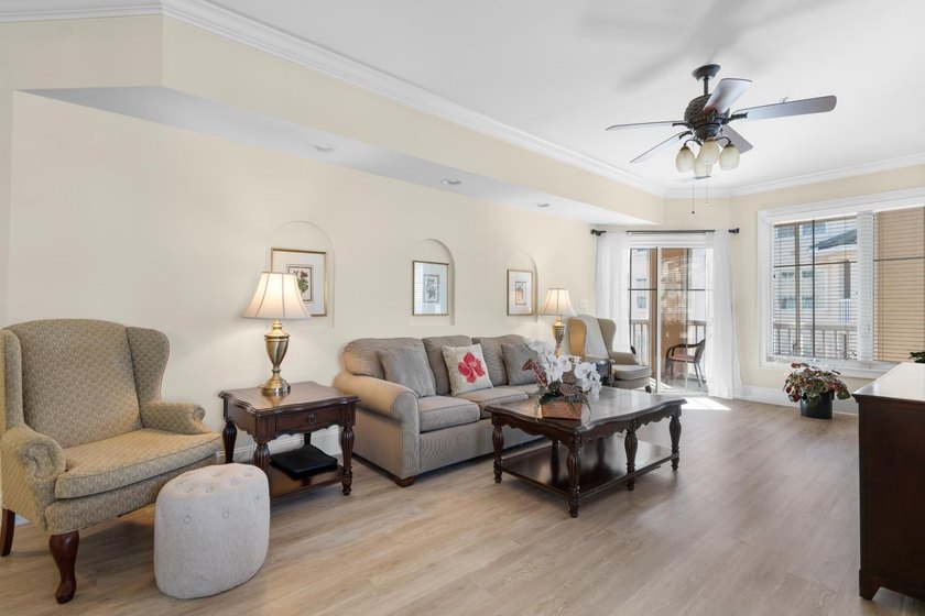 Sunlight pours into this bright, open 3-bedroom, 2-bath end-unit - photo 9