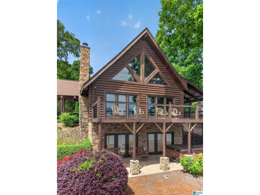 Experience refined lakefront living in this exceptional log - photo 50