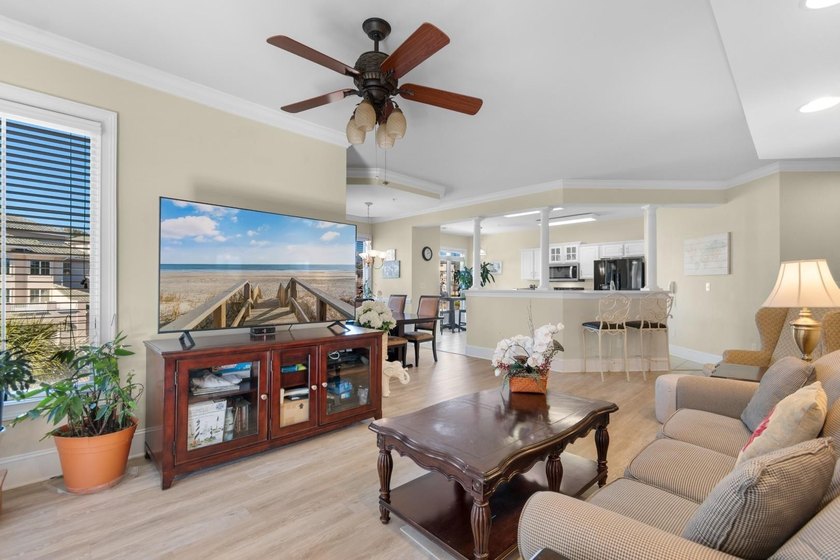 Sunlight pours into this bright, open 3-bedroom, 2-bath end-unit - photo 10