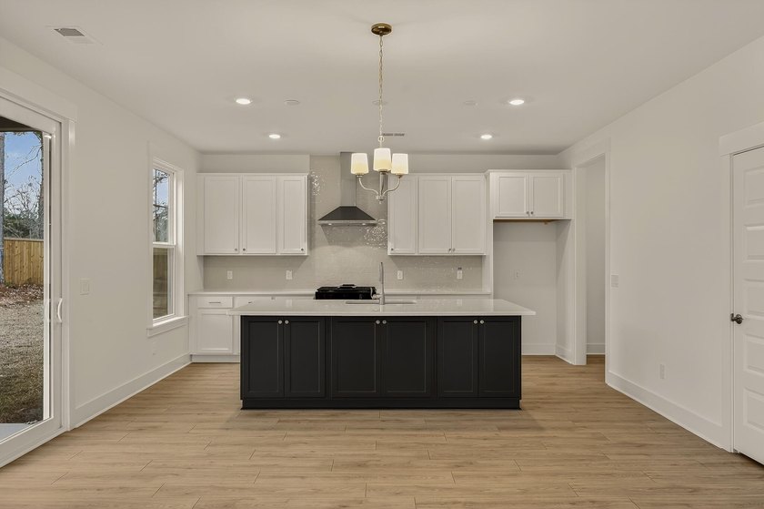 The Ellis is your chance to own a stunning 4-bedroom, 2.5 bath - photo 7