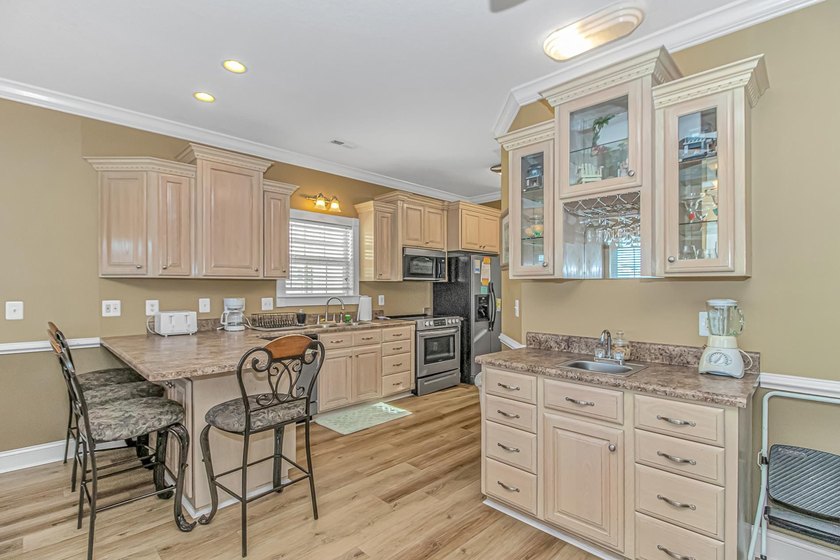 This LAKE FRONT 5 bedroom 3.5 bath raised beach house with - photo 4