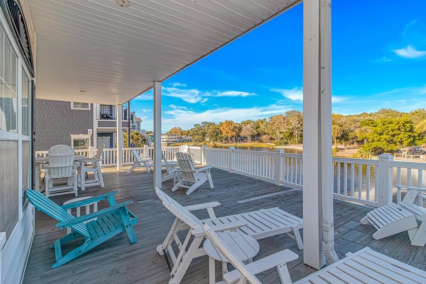 This LAKE FRONT 5 bedroom 3.5 bath raised beach house with - photo 8
