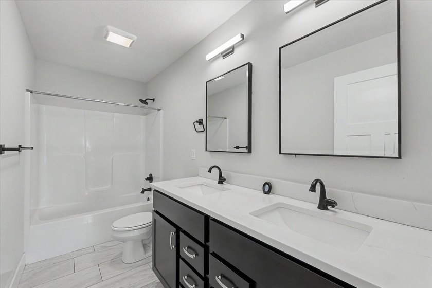 Spacious and beautifully designed, this two-story home with a - photo 31