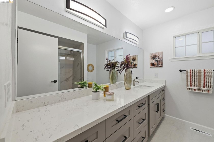 Welcome to this impeccably remodeled home in the highly - photo 19
