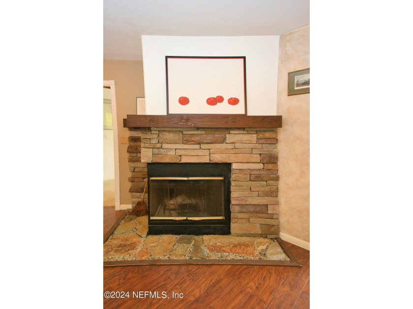 Discover this rare ground-floor unit nestled in a sought after - photo 8