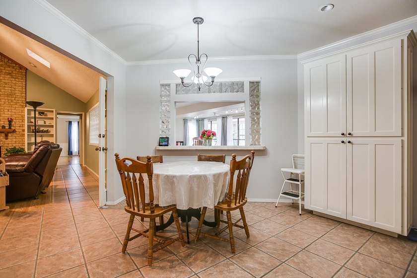 WOW!!! Spacious 4BR/2BA home located on a beautiful tree lined - photo 11