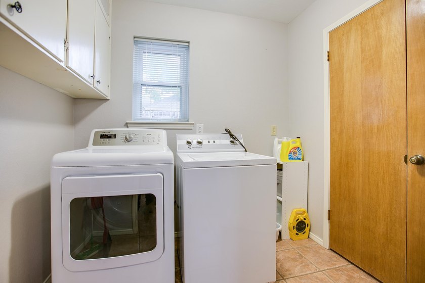 WOW!!! Spacious 4BR/2BA home located on a beautiful tree lined - photo 12