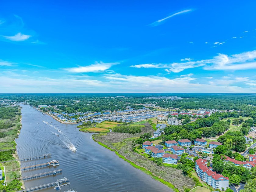 Experience coastal living at its finest in this furnished - photo 3