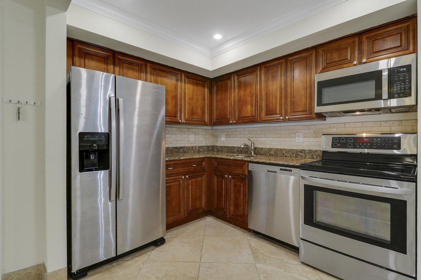 Welcome home to the tranquil community of Dunbar Woods, nestled - photo 14