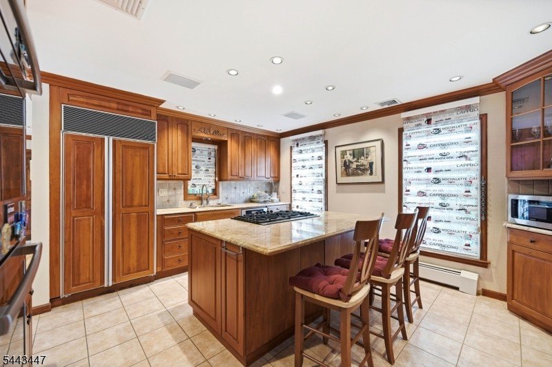 Welcome to this custom built center hall colonial located in the - photo 11