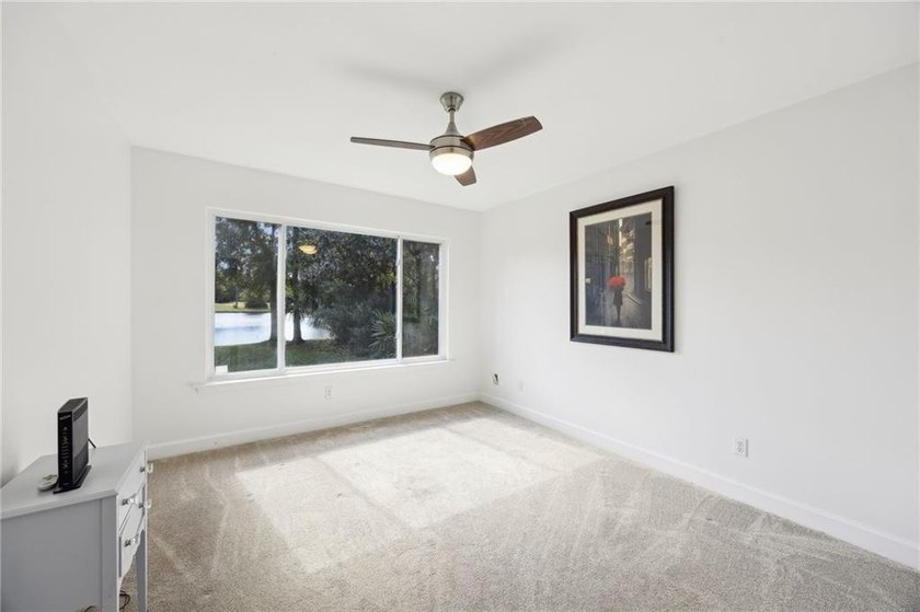 THIS BEAUTIFULLY UPDATED THREE-BEDROOM HOME IN OSPREY COVE IS - photo 31