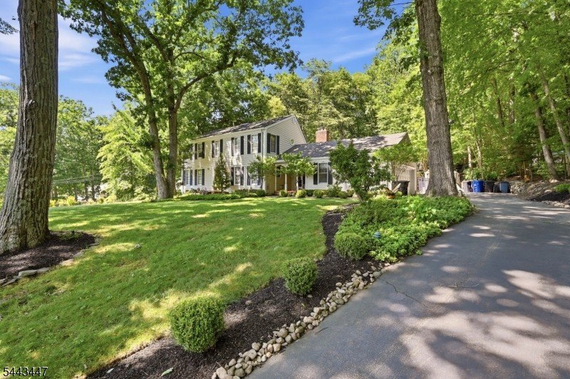 Welcome to this custom built center hall colonial located in the - photo 35