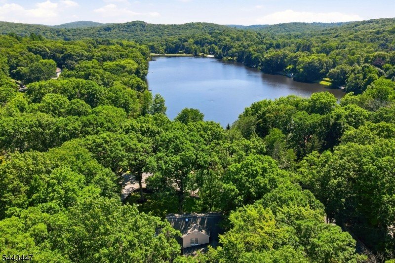 Welcome to this custom built center hall colonial located in the - photo 39