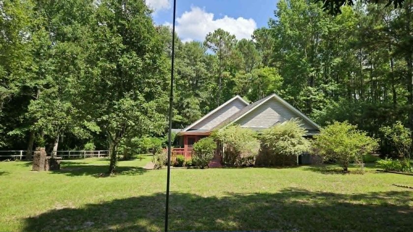 Escape the cookie cutter subdivisions and step into a private - photo 4