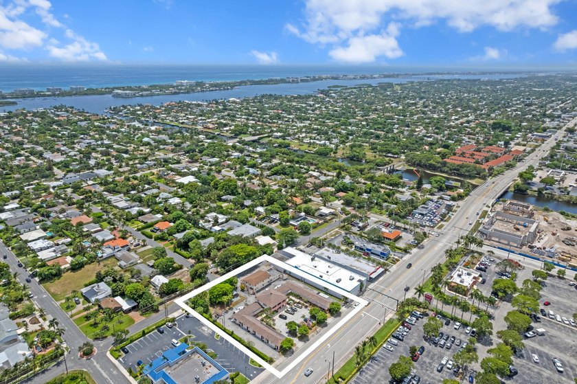 Unlock the full potential of this rare and expansive 1-acre - photo 9