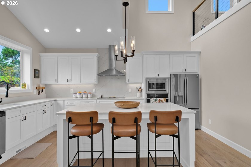 Contemporary coastal luxury awaits in this exceptional - photo 13
