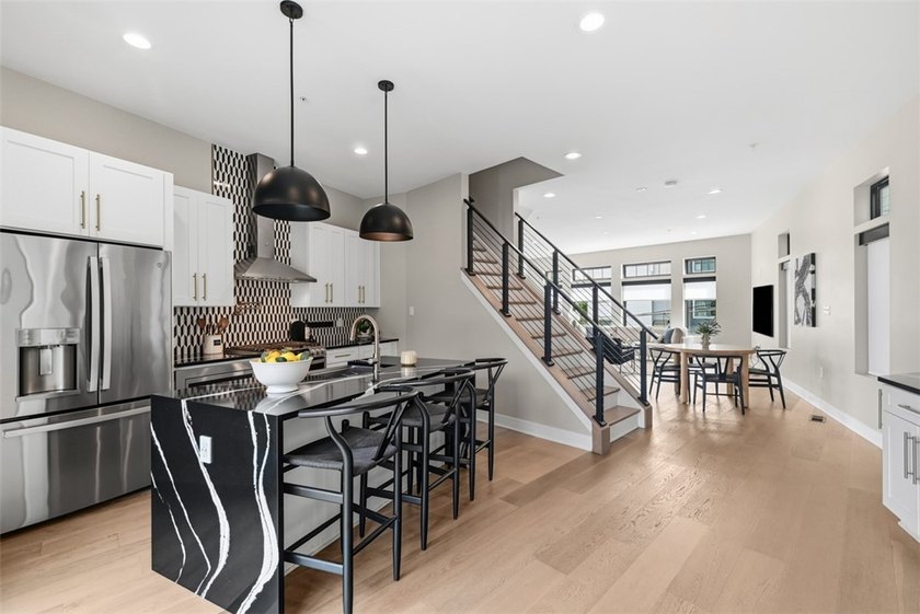 Welcome to 724 52nd Street, a striking free-standing modern - photo 14