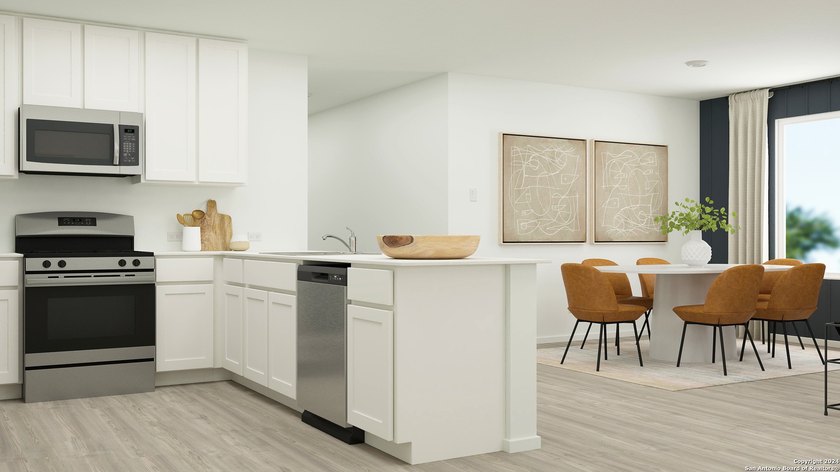 The Ramsey- This new single-story design makes smart use of the - photo 15