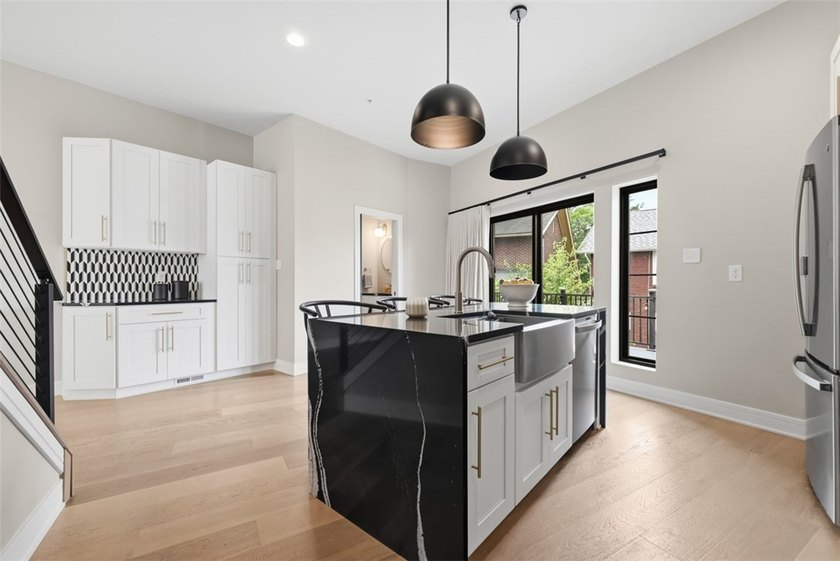 Welcome to 724 52nd Street, a striking free-standing modern - photo 15