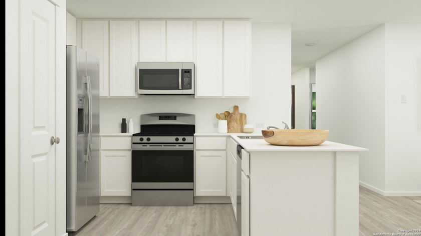 The Ramsey- This new single-story design makes smart use of the - photo 16