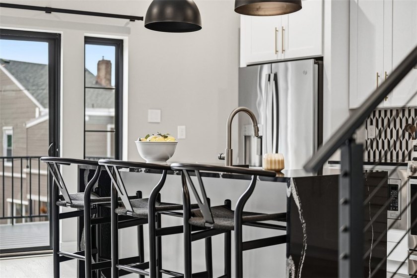 Welcome to 724 52nd Street, a striking free-standing modern - photo 16
