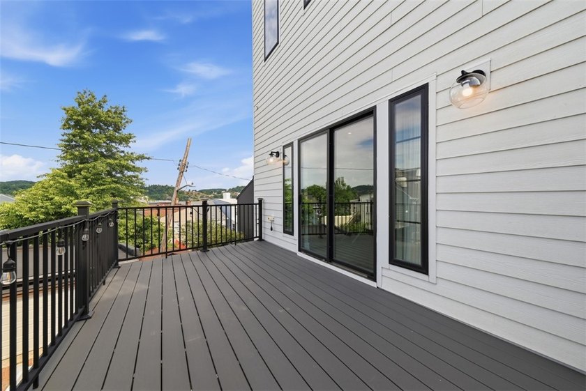 Welcome to 724 52nd Street, a striking free-standing modern - photo 17