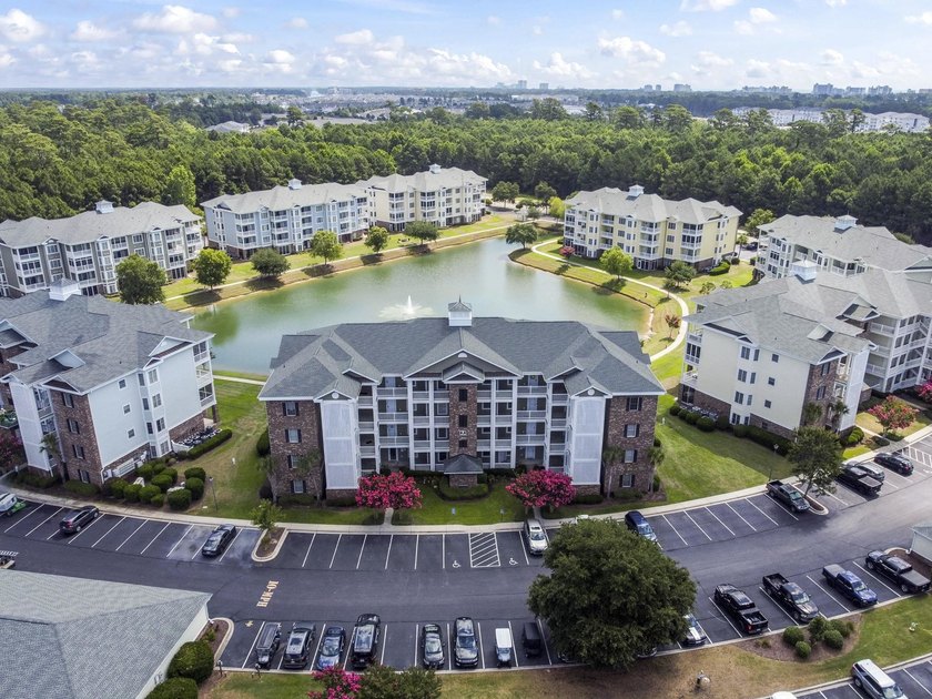 Don't miss this beautifully maintained top-floor end-unit condo - photo 2