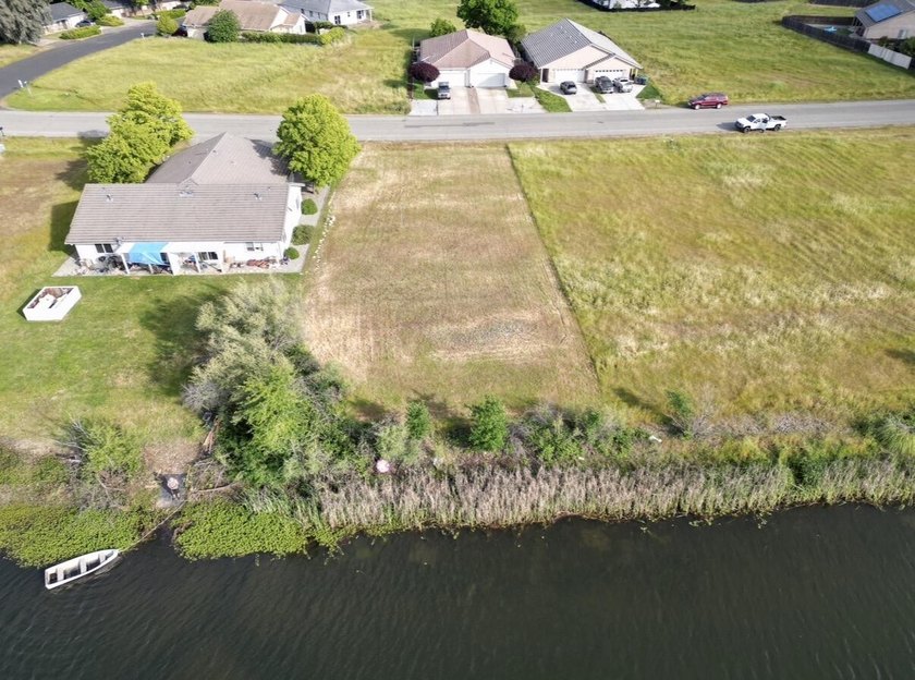 Build your dream home on the water in the gated community of - photo 11