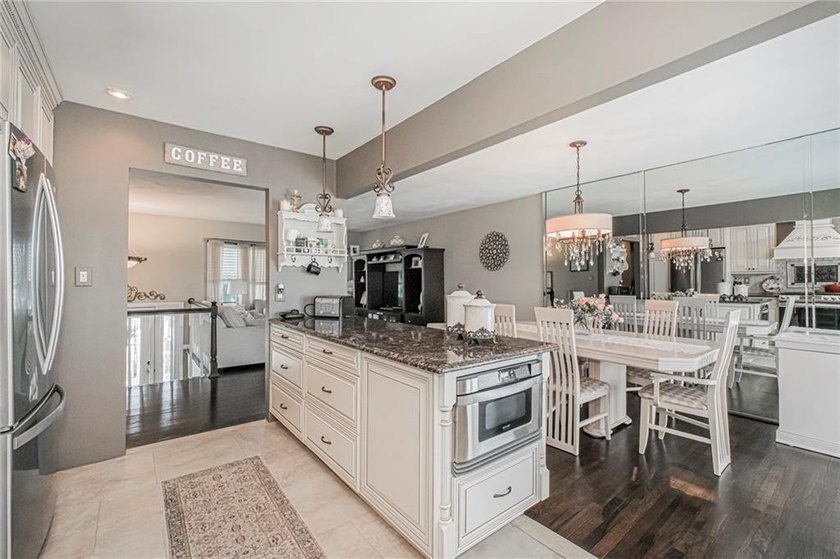 This beautiful detached single-family home is situated on a - photo 18