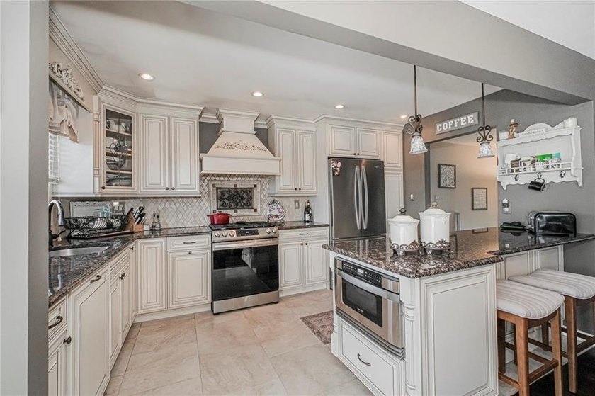 This beautiful detached single-family home is situated on a - photo 19