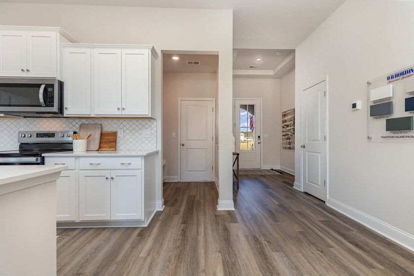 This Eaton home is a chef and entertainer's dream! With a large - photo 3