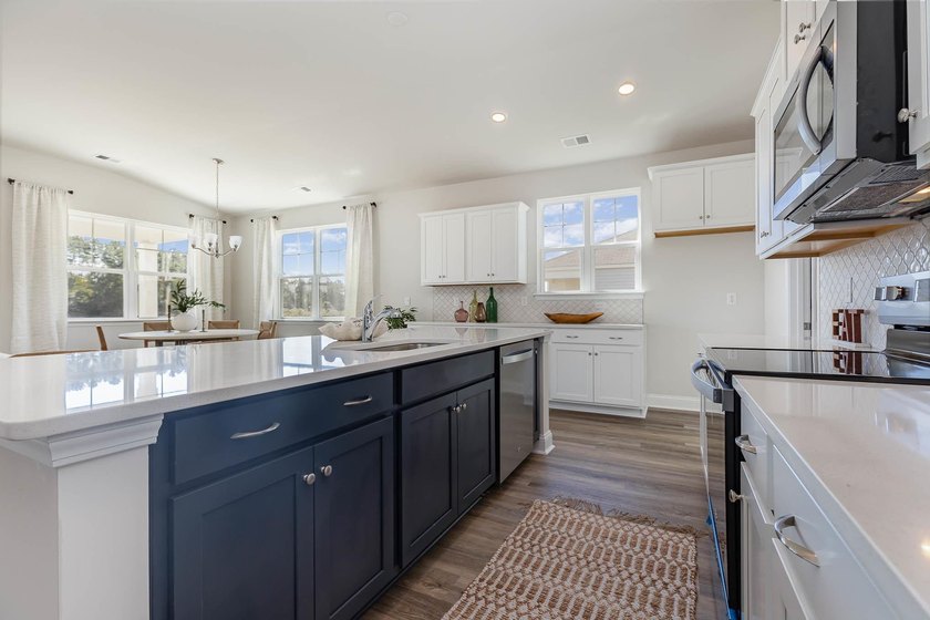 This Eaton home is a chef and entertainer's dream! With a large - photo 6