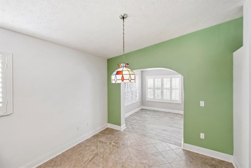 Welcome home to this impeccably kept home in a 55+ gated - photo 18