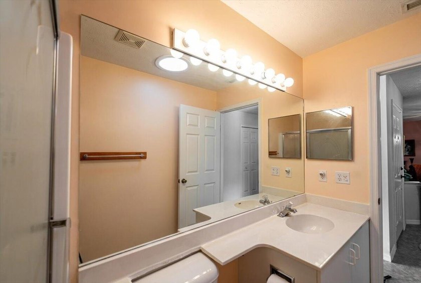 Welcome home to this impeccably kept home in a 55+ gated - photo 32