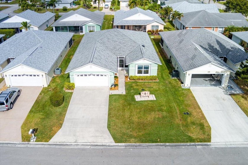 Welcome home to this impeccably kept home in a 55+ gated - photo 40
