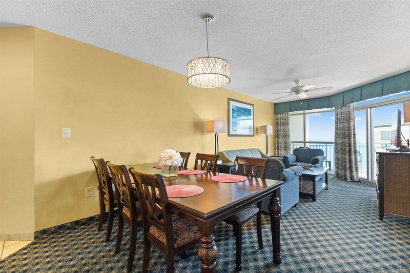 This beautifully furnished three bedroom Penthouse level unit at - photo 9