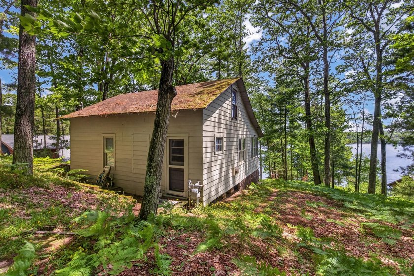 Enjoy stunning water views from this 2-bedroom, 1-bathroom cabin - photo 5